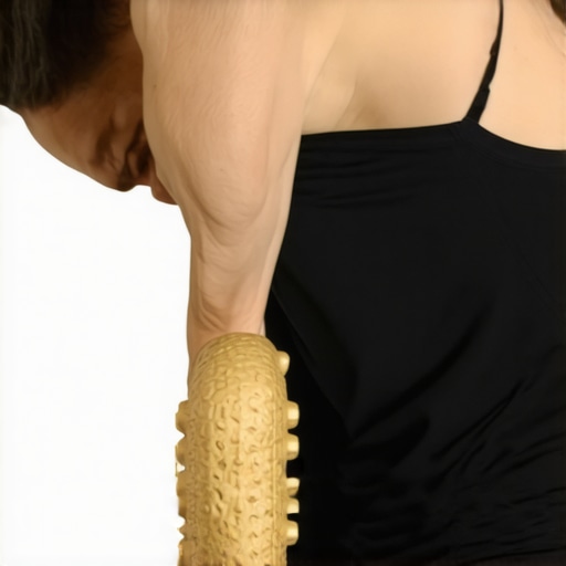 Person using a massage peanut tool against a wall for upper back and shoulder mobility.